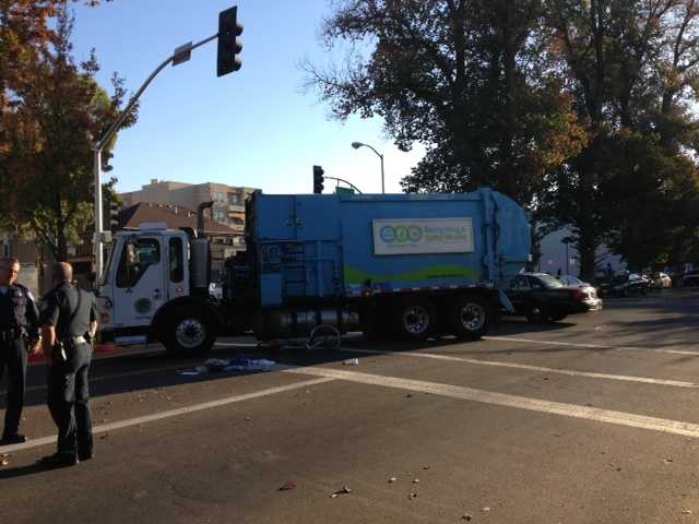 dsny garbage truck hits cyclist