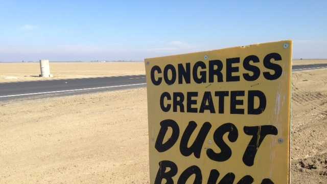 Signs in Fresno County blame the drought on lawmakers. 