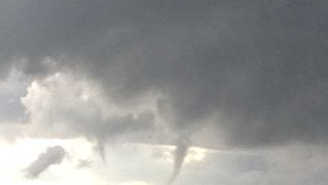 Photos: Funnel clouds, hail, rainbows show up across NorCal