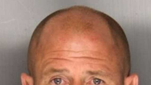 Homicide suspect in custody after hours-long standoff