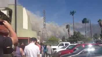 A teacher in Rancho Cucamonga sent in this video of smoke from a massive fire approaching her school. The school has since been evacuated.