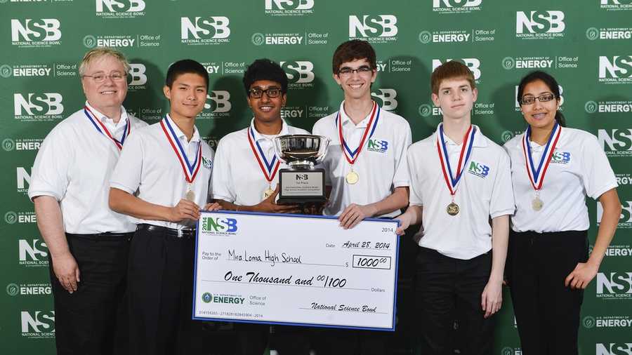 After winning their second national championship in two years, Mira Loma's Science Bowl team posed with their check. From left to right, coach James Hill, team captain Daniel Shen, Arvind Sundararajan, Matt Kempster, Jack Gurev, and Preethi Raju 