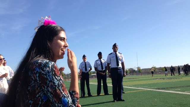Sufia Mehmood, 17, reacts to a surprise ceremony at River City High School on Thursday morning.