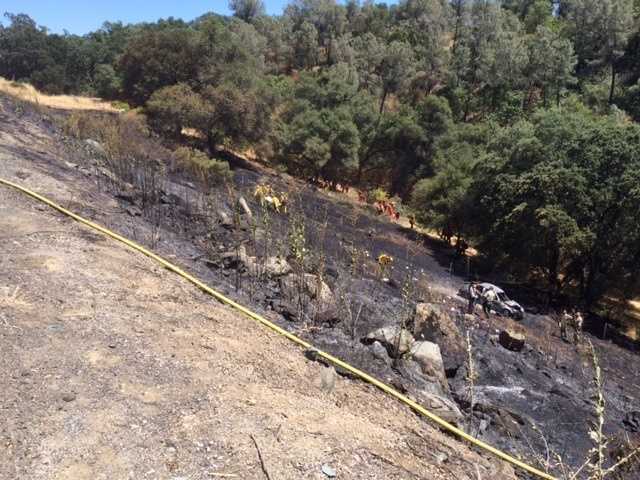 Photos: Deadly crash sparks grass fire in El Dorado Co.