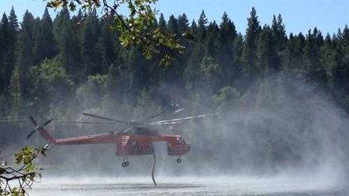 Fire crews were conducting water drops to fight the King Fire. (Sept. 15, 2014)