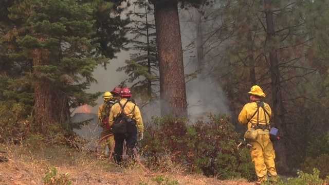 Crews continued battling the King Fire on Monday, which continues to burn and keep people out of their houses in El Dorado County. Air-quality concerns are becoming more and more prevalent, as well (Sept. 22, 2014).