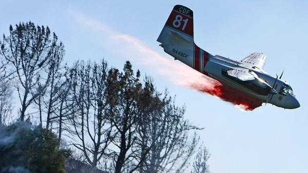 Cal Fire tanker 81 is seen here helping battle the Loma Fire. The air tanker sent to take on a wildfire on Wednesday smashed into a canyon wall on the edge of Yosemite National Park.