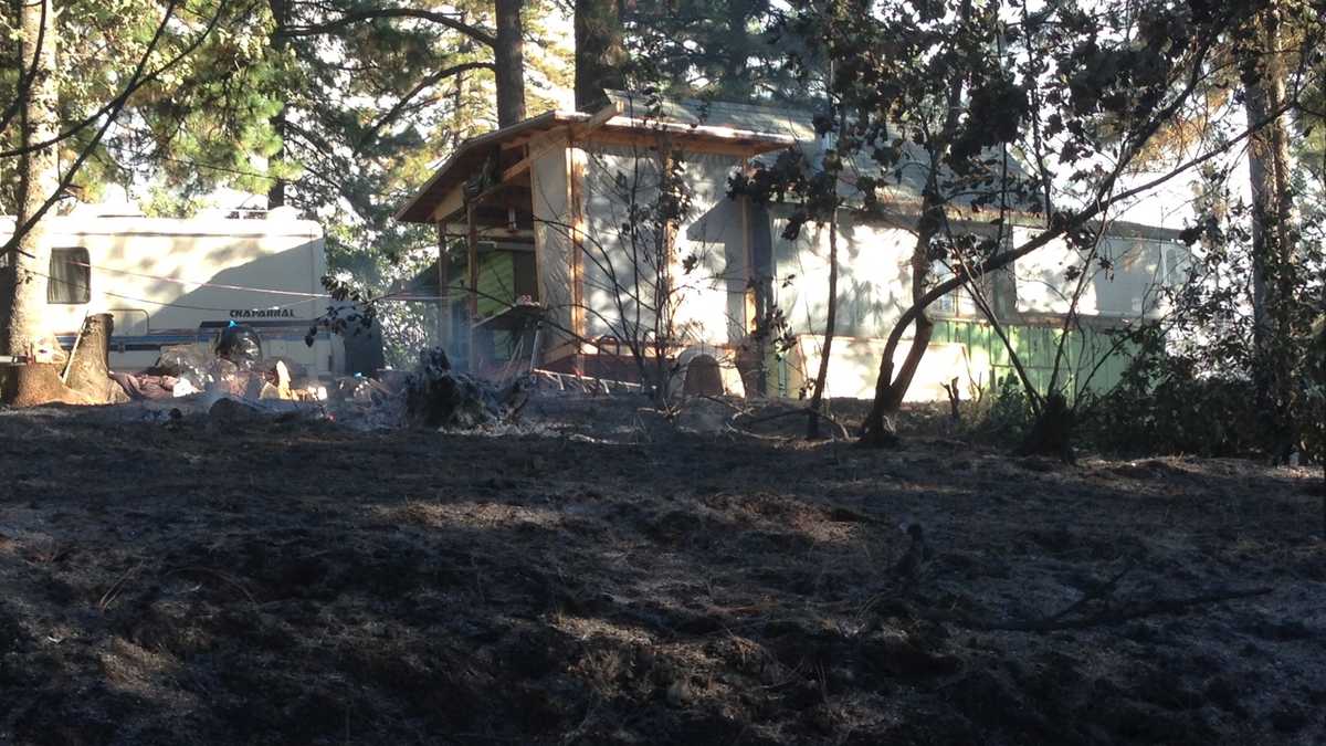 Photos Crews save home from Applegate Fire