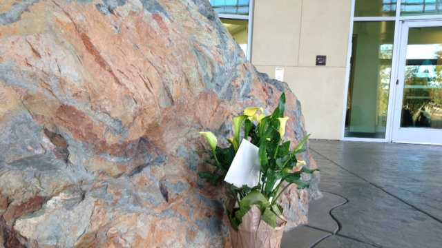 Flowers are left for the fallen Placer County sheriff's deputy. (Oct. 24, 2014)