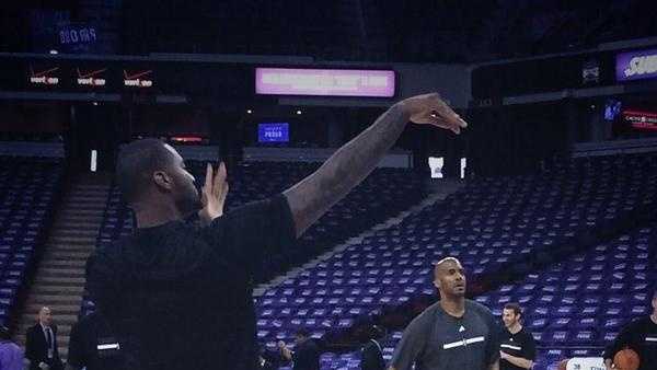 Kings star DeMarcus Cousins shows off his form as purple shirts line the seats of Sleep Train Arena (Oct. 29, 2014).