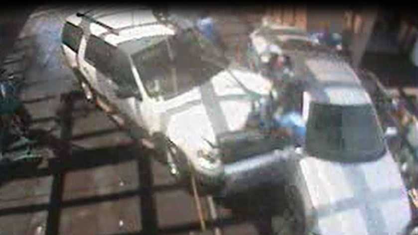 Surveillance video provided by Bubbles Car Wash shows the moment of impact.