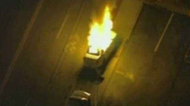 Live video shows a St. Louis County sheriff's deputy patrol car on fire.
