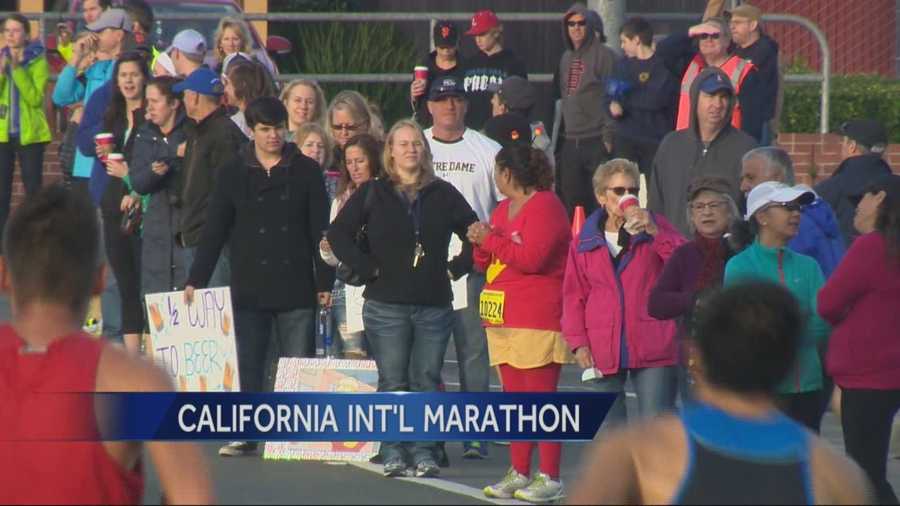 Spectators lined the route of the 26.2 mile California International Marathon to cheer on the runners.