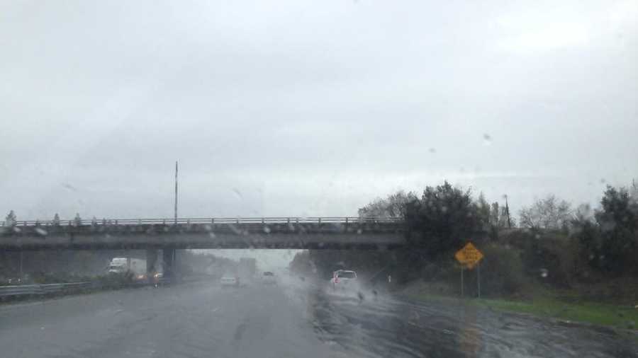 Moderate rain falls on Interstate 5 in downtown Sacramento on Friday. (Dec. 19, 2014)