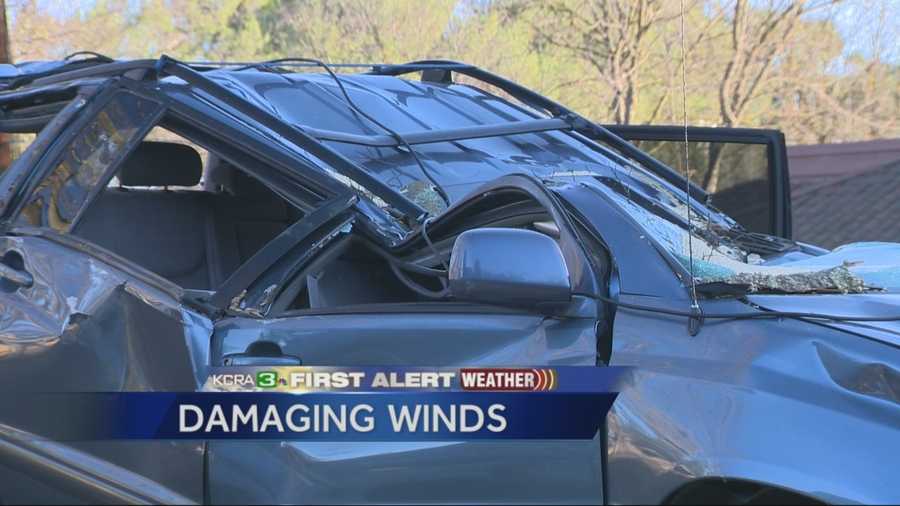 Giant tree falls on teenage driver's SUV in Davis