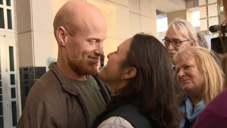 Eric McDavid is greeted by his girlfriend, Jenny Esquivel, following a judge's decision to overturn his eco-terrorism conviction.