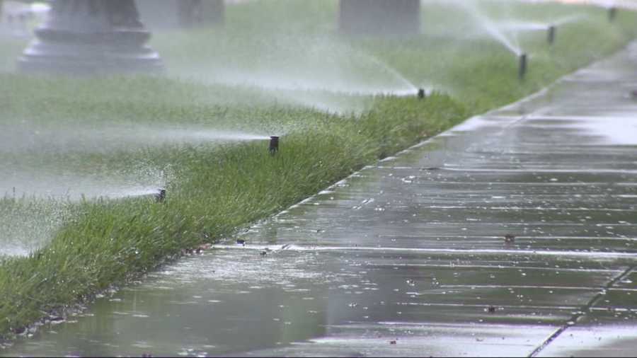 With the rain on Easter Sunday, new state rules prohibit watering within 48 hours of measurable rainfall. But the headquarters of one state agency has been watering non-stop.