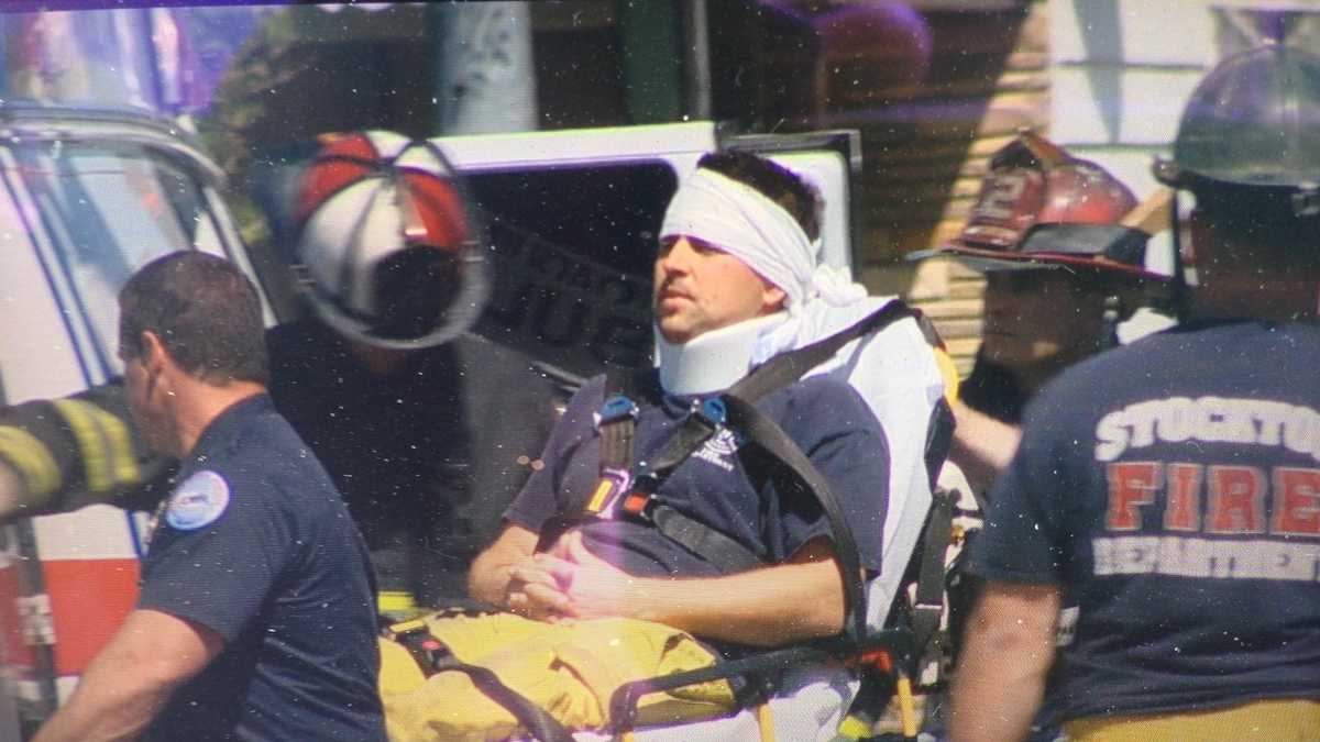 SUV slams into fire truck; 1 dead, 3 firefighters hurt