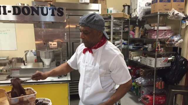 The owner of Danny's Mini Donuts mixes chocolate for the first-ever Chocolate Week in Old Sacramento.