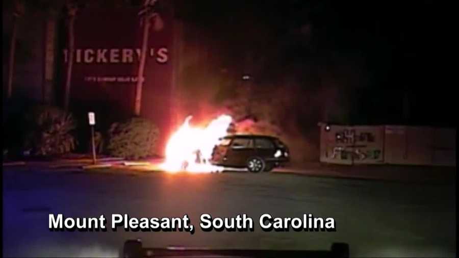 Dashcam video captured a South Carolina police officer pulling a man from a burning vehicle.