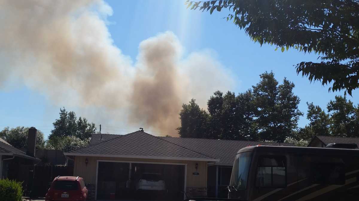 Crews get control of grass fire burning in Stockton