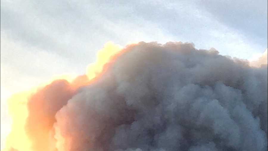 A KCRA viewer sent us this picture of a Cal Fire plane flying by a cloud of smoke from the Wragg Fire. 