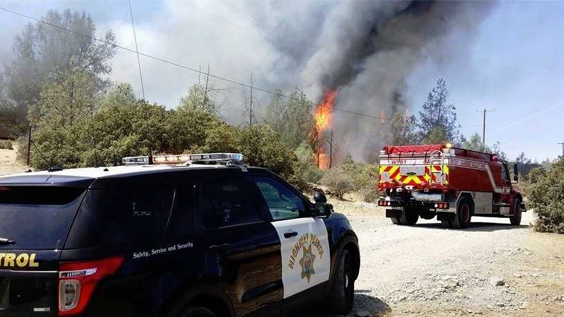 At least one structure was destroyed in a fire that broke out in the Garden Valley area Monday. (Aug.17, 2015)