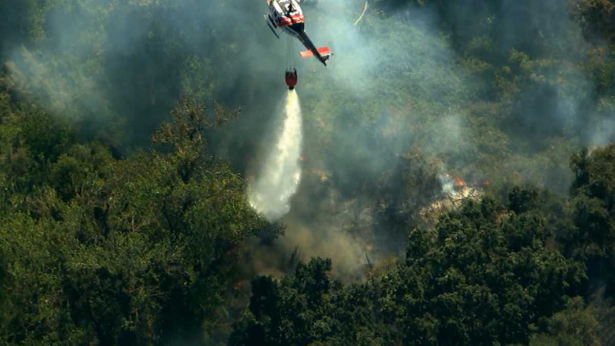 Fire threatening homes near Oakdale is contained