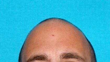 Brian Ballasch, a veteran suffering from PTSD, is accused of shooting a Mariposa County sheriff's deputy after a traffic stop and chase, according to authorities.