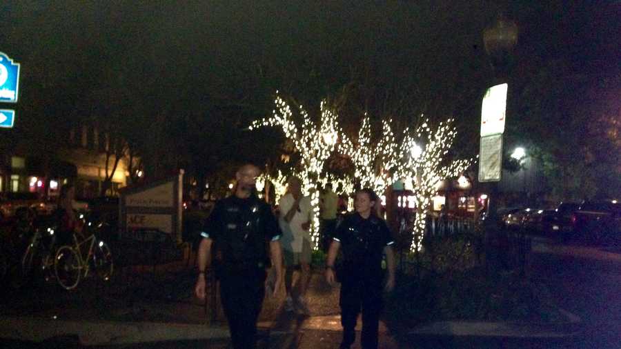 Two Davis police walk downtown on Friday, Oct. 2, 2015 in hopes to limit violence.