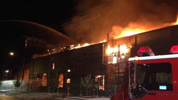 A three-alarm fire that broke out Saturday morning ripped through a vacant, historic building at R and 16th streets in downtown Sacramento. (Nov. 7, 2015)