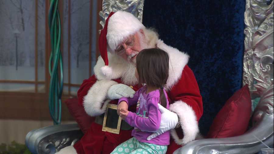 Santa talks to a little girl at Arden Fair Mall on Wednesday, Nov. 11, 2015.