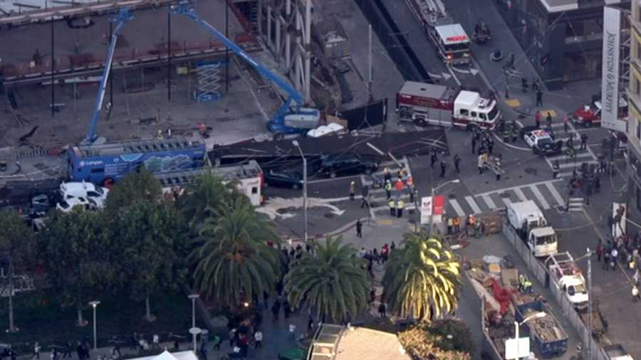 A tour bus crashed Friday, Nov. 13, 2015, at the intersection of Stockton and Post at Union Square in San Francisco.