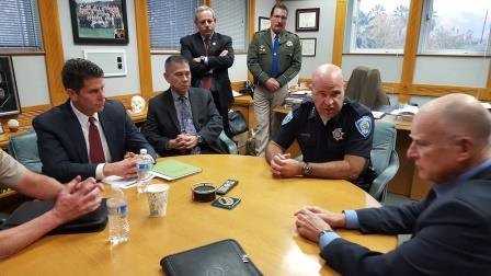 California Gov. Jerry Brown and California Office of Emergency Services Director Mark Ghilarduccui get briefed on Thursday, Dec. 3, 2015, by San Bernardino Police Chief Jarrod Burguan, the FBI and others on the investigation into the mass shooting.