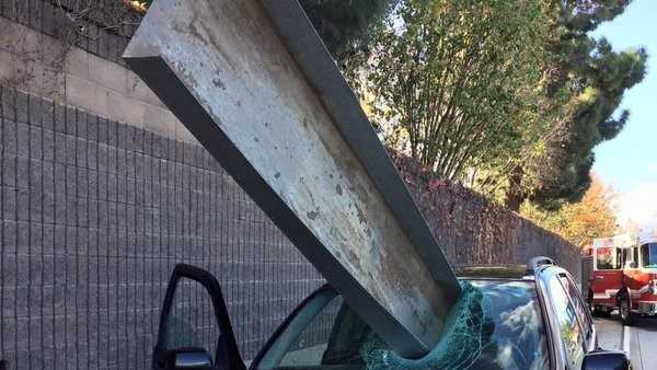 A metal tray crashed through the windshield of a car Friday, Dec. 11, 2015, on Interstate 280 near San Jose, the fire department said.