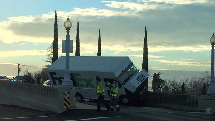 A crash involving a FedEx truck and a vehicle is blocking the Sierra Street Bridge in Roseville on Friday.