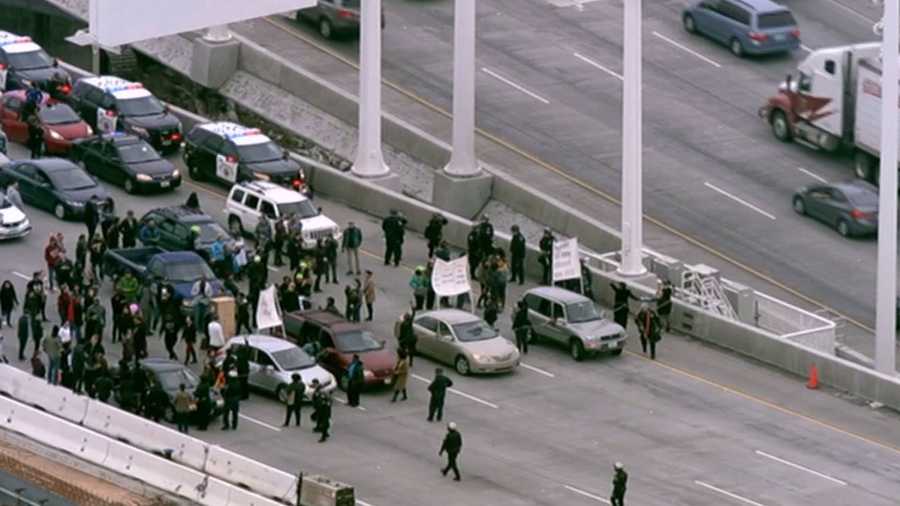 Protesters block traffic on the Bay Bridge,westbound Highway 80, on Monday, Jan. 18, 2016, as part of an MLK Day march.
