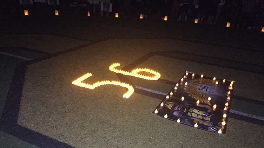 Ronny Andrews' jersey number is lit up by candles on the Del Oro High School football field on Thursday, Jan. 21, 2016. Ronny died in a car crash on Saturday night.