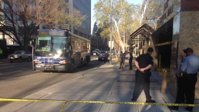 Woman becomes trapped under bus in downtown Sacramento