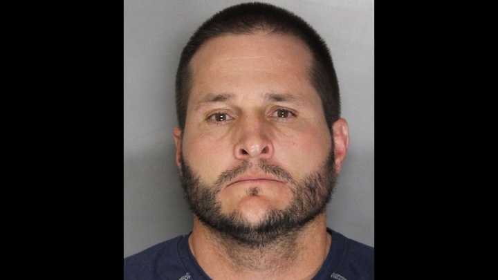 Sheldon High School teacher, John Misplay, turned in himself and was charged with two counts of child annoyance, police said.