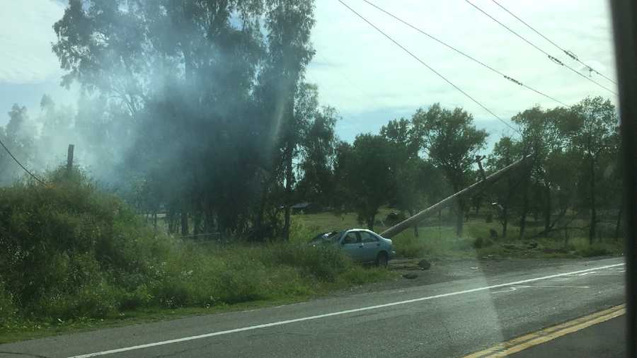 A car crash into a power pole on PFE Road led to a power outage in Citrus Heights on Wednesday, April 13, 2016. Photo shared by KCRA Viewer Greg G. shows the aftermath of the crash.