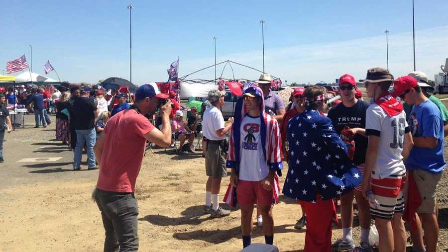 Supporters for presidential candidate Donald Trump line up at the Sacramento Jet Center on Wednesday, June 1, 2016, as they wait for his campaign rally to begin.