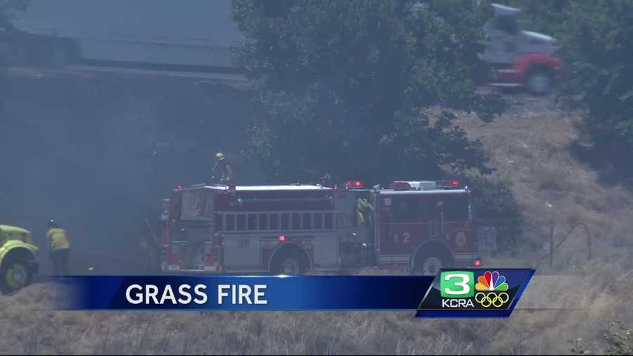 Grass fire by Interstate 5 near Richards Boulevard in Sacramento.