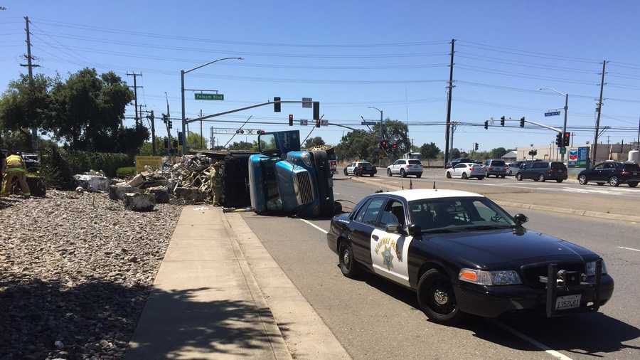CHP cleaning up a mess after a big rig full of recycled materials overturns at Hazel Avenue and Folsom Road Saturday.
