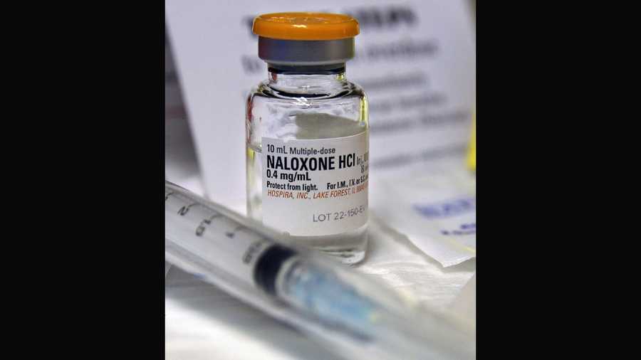 In this Wednesday, Feb. 19, 2014, file photograph, a small bottle of the opiate overdose treatment drug, naloxone, also known by its brand name Narcan, is displayed at the South Jersey AIDS Alliance in Atlantic City, N.J.
