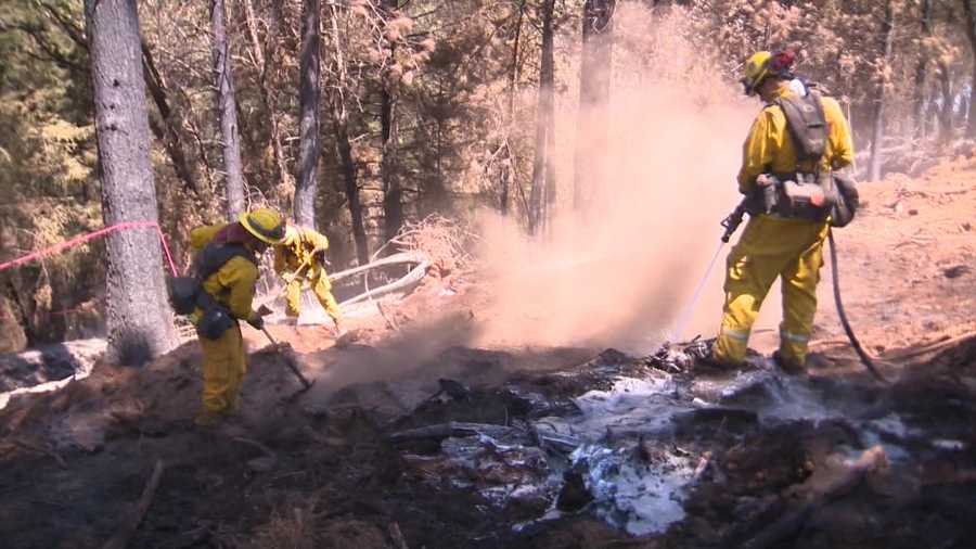 Crews make progress against wildfire burning near