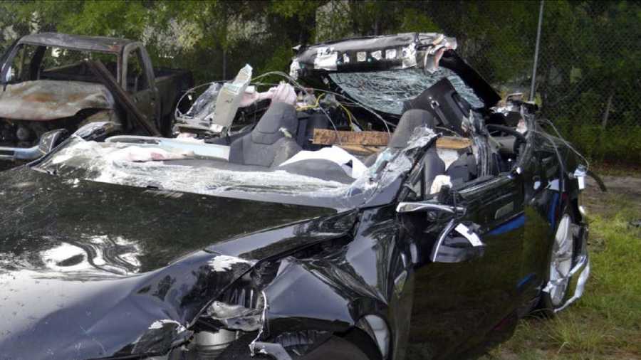 This photo provided by the NTSB via the Florida Highway Patrol shows the Tesla Model S that was being driven by Joshua Brown,who was killed, when the Tesla sedan crashed while in self-driving mode on May 7, 2016.