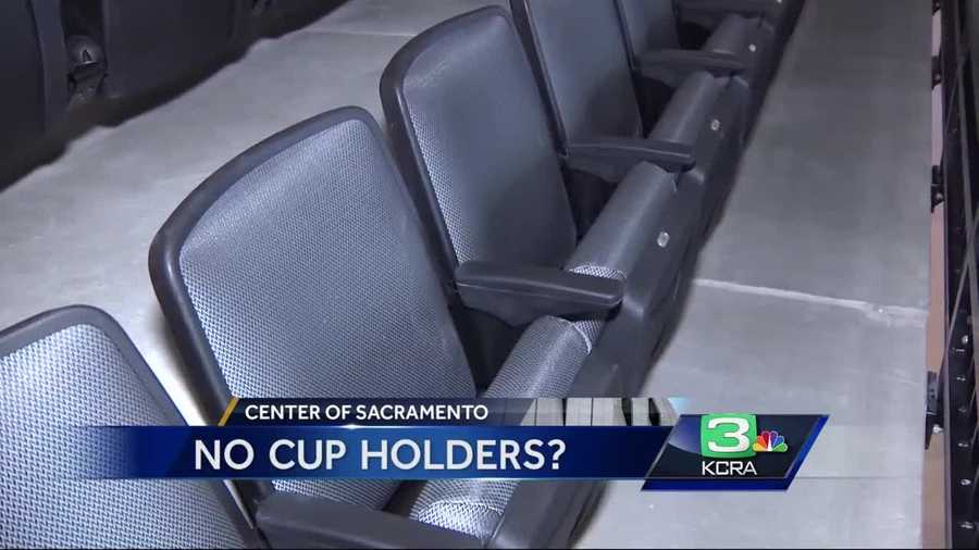 Yes, there are no cup holders in for the upper level seats in the new Golden 1 Center.