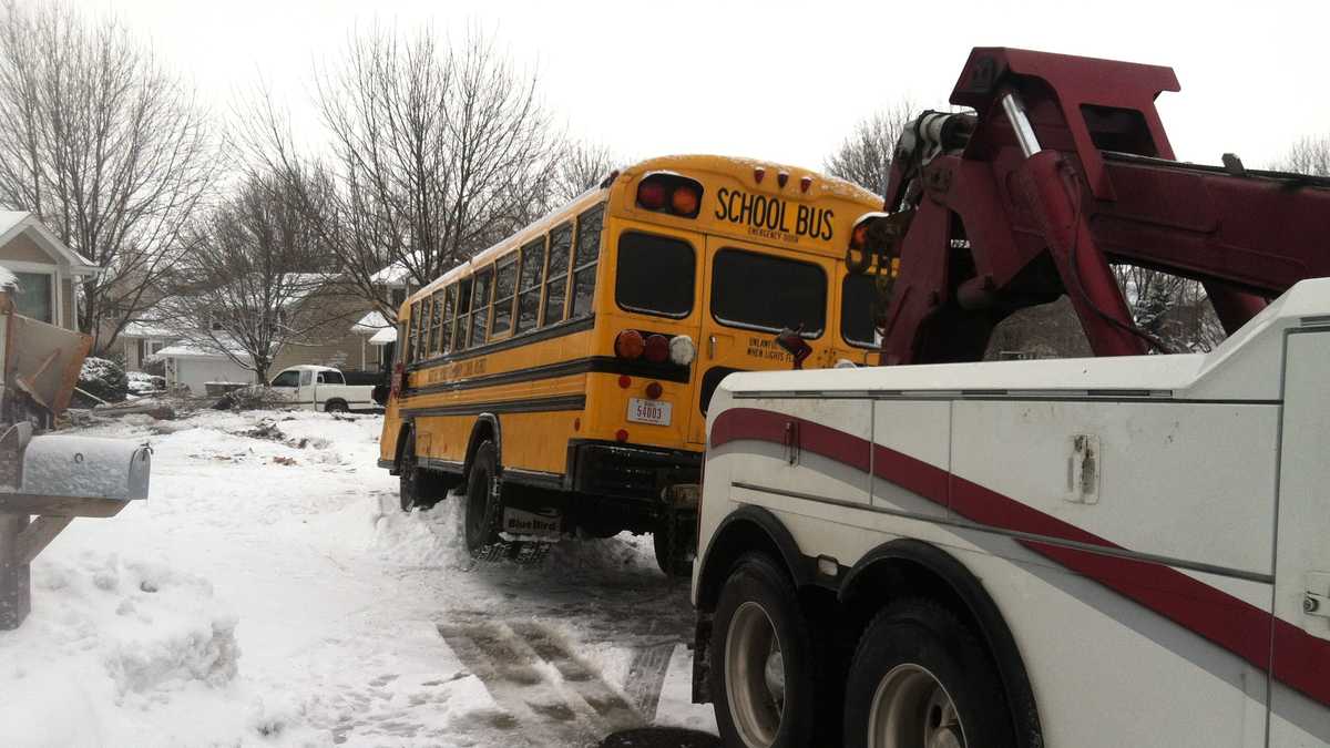 Photos: School bus crashes into house