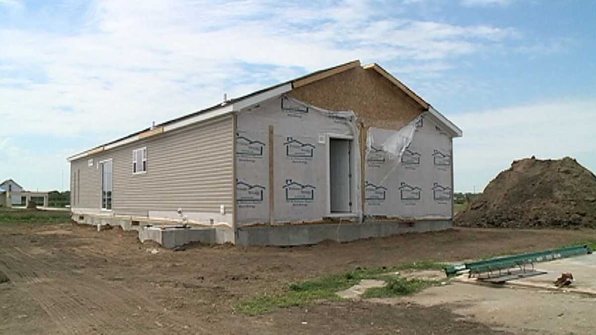 First home goes up in tornado-ravaged town